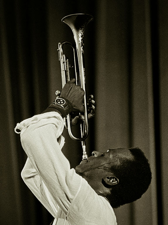 Miles Davis playing his Martin named Moon and Stars